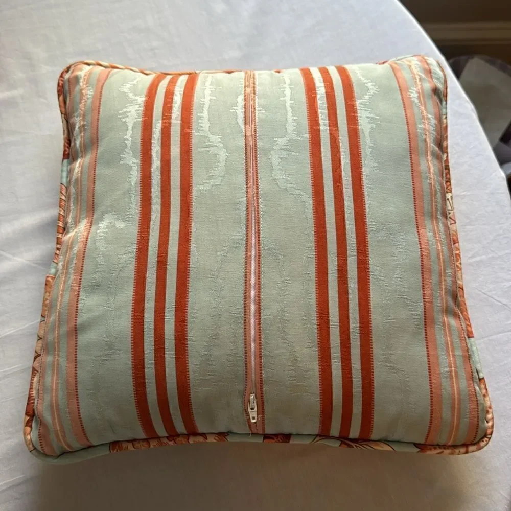 Orange and blue decorator pillow, 14X 14 in